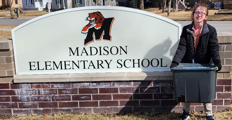A sign on a brick wallAI-generated content may be incorrect.